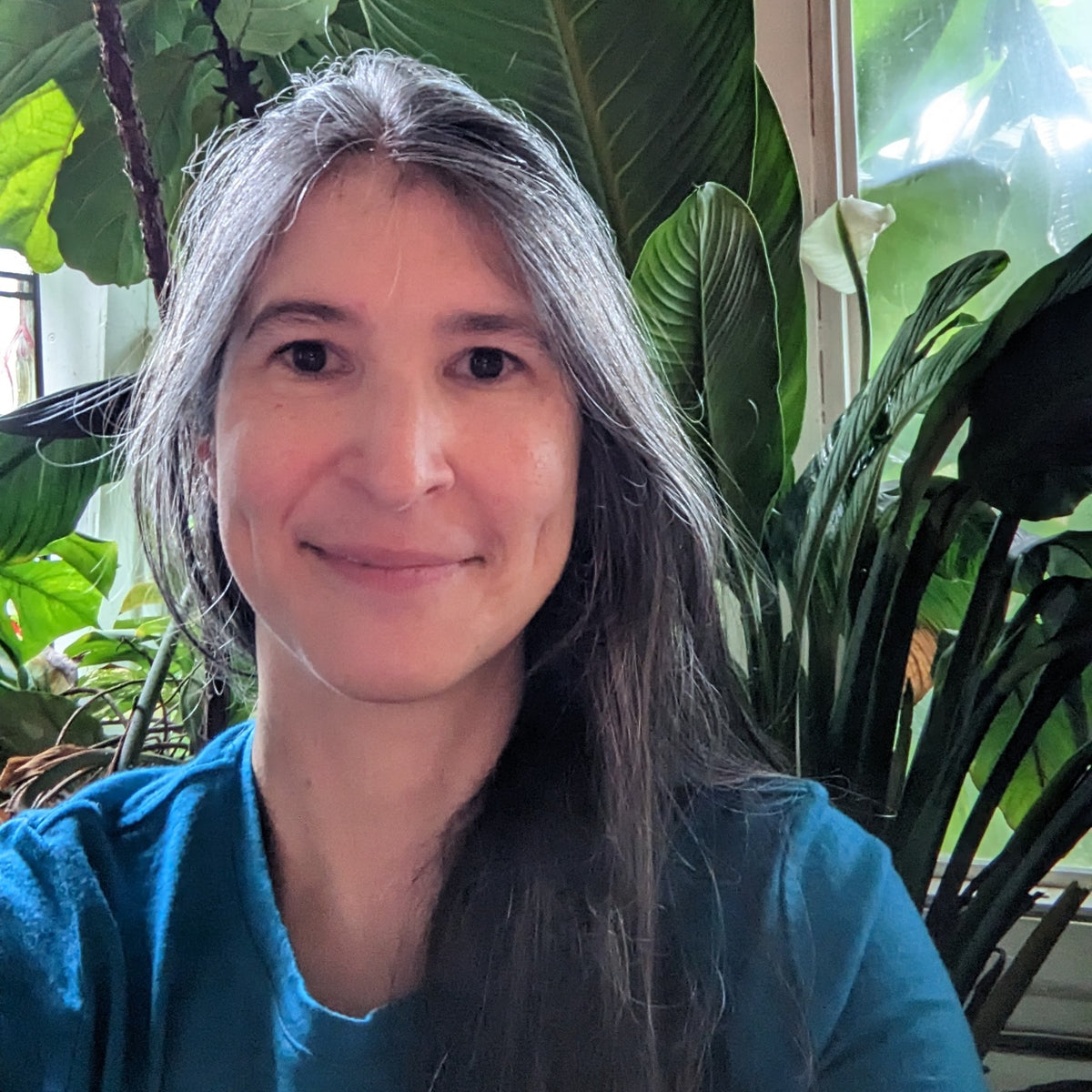 Joy Lew with Houseplants