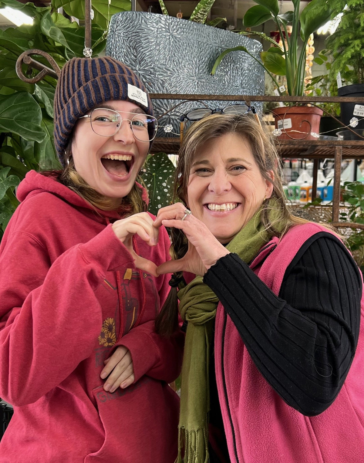 Kira and Cristi Terrarium Workshop Heart hands cropped