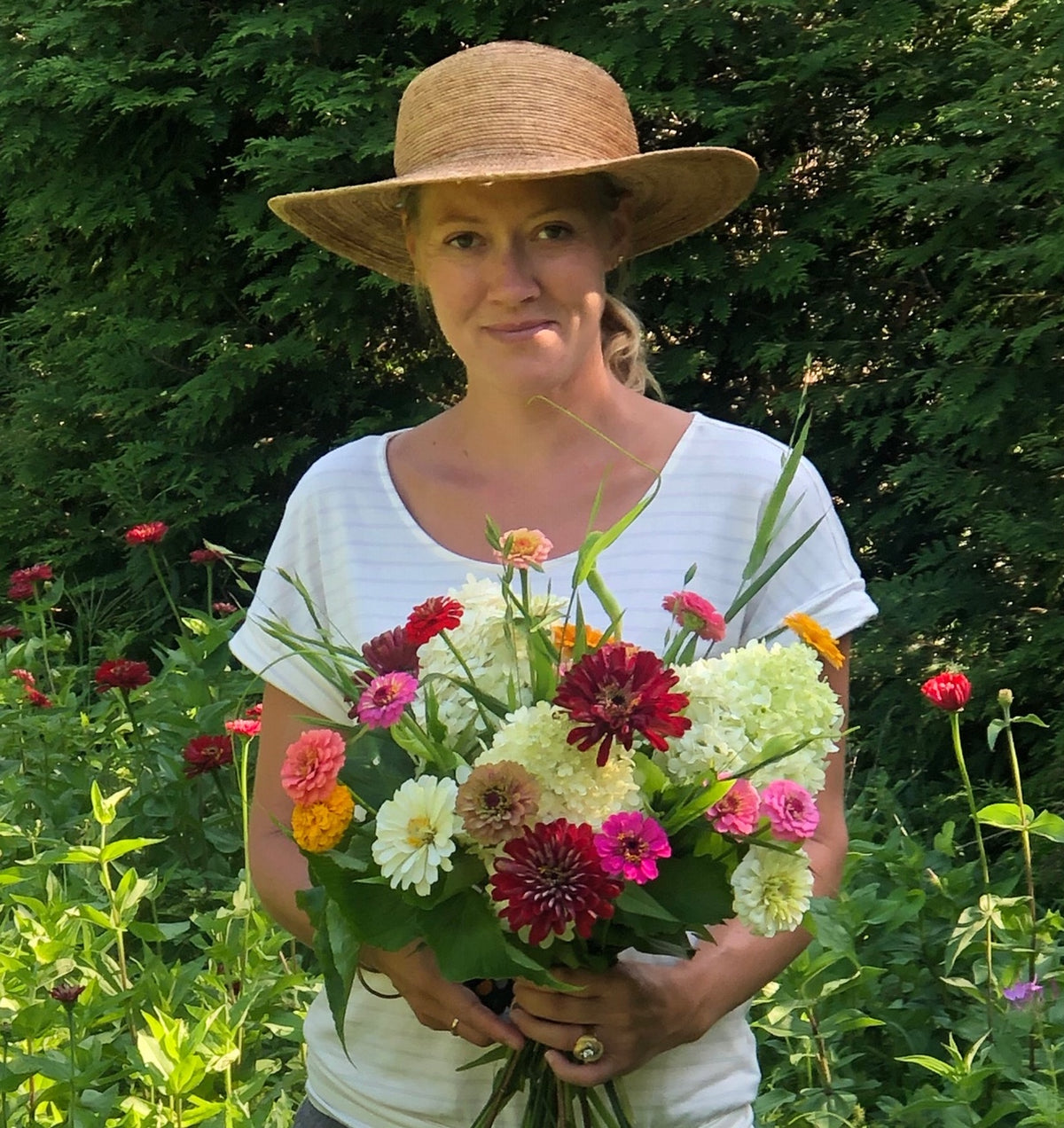 Rachel Brownlee with a bouquet of flowers